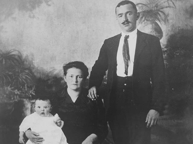 Historical photo of baby Maddalena with parents