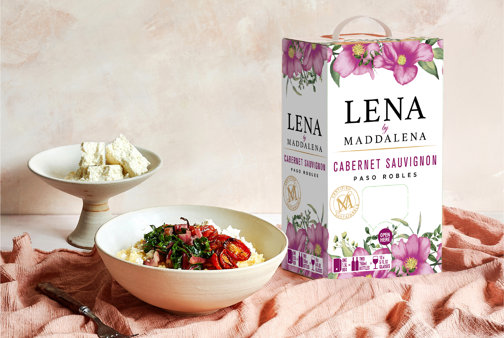 LENA by Maddalena Cabernet Sauvignon on a table with fruit
